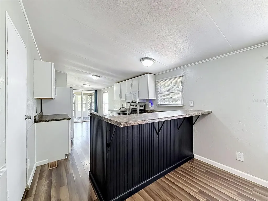 15936 Archer Street & 9718 Denton Avenue Hudson FL 34667