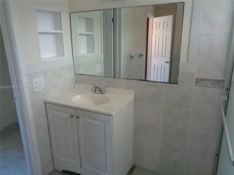 450 Golden Isles Drive Hallandale Beach FL 33009