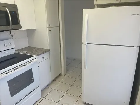 450 Golden Isles Drive Hallandale Beach FL 33009