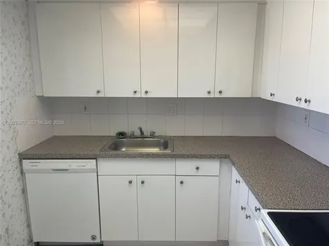 450 Golden Isles Drive Hallandale Beach FL 33009