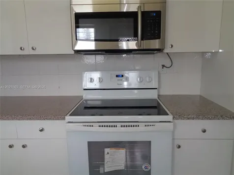 450 Golden Isles Drive Hallandale Beach FL 33009