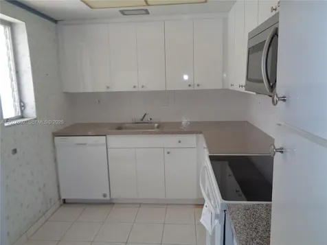 450 Golden Isles Drive Hallandale Beach FL 33009