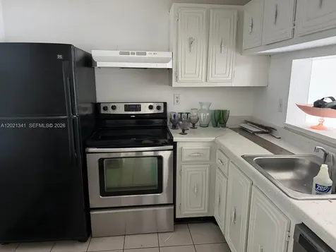 492 NW 165th St Road Miami FL 33169