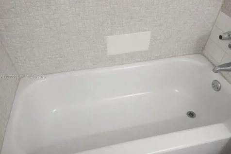 496 NW 165th Miami FL 33169