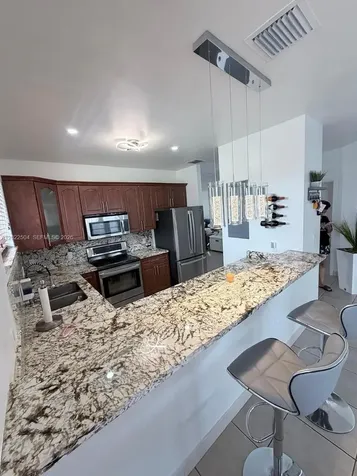 1670 NW 73rd Street Miami FL 33147