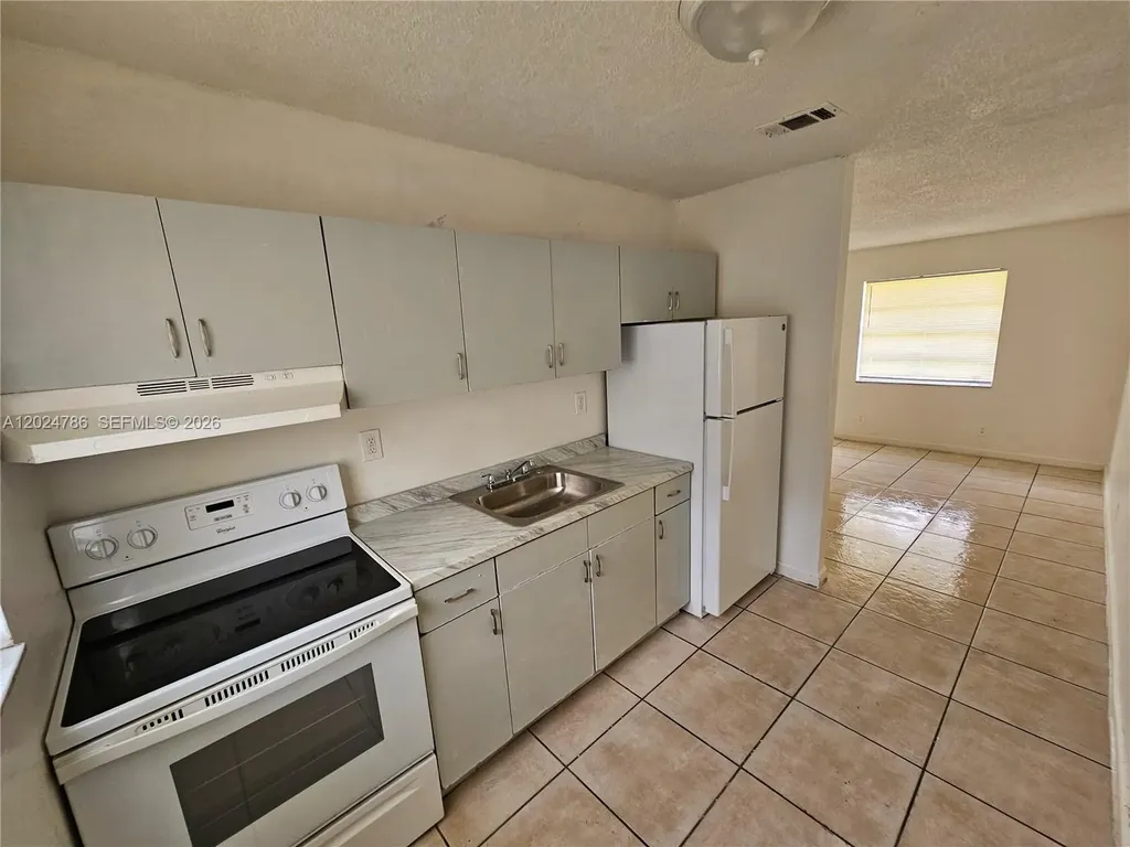 2451 NW 8th Place Fort Lauderdale FL 33311