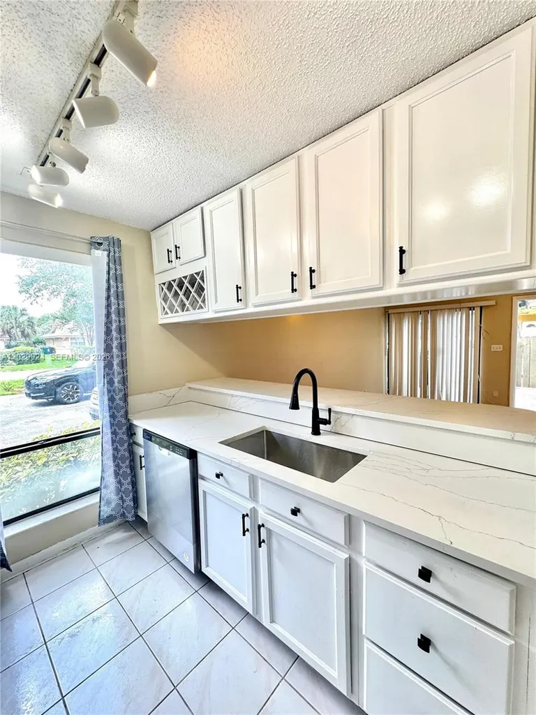 4240 NW 114th Terrace Coral Springs FL 33065