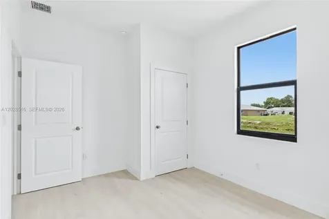 225/227 Hightower Avenue S Lehigh Acres FL 33973