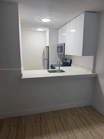 496 NW 165th Street Road Miami FL 33169