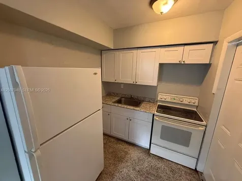 1960 NW Flagler Terrace Miami FL 33125