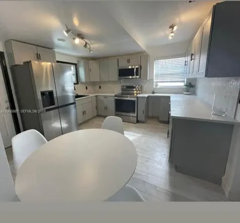 311 NW 32nd Court Miami FL 33125