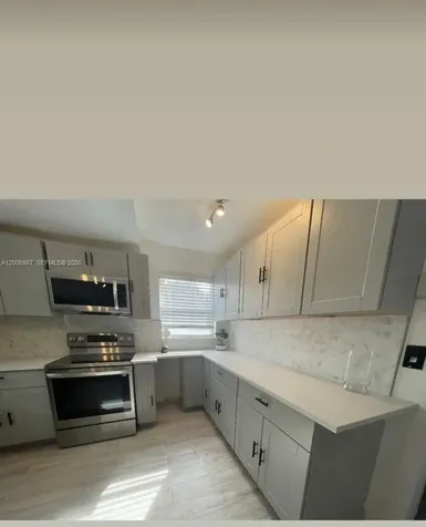 311 NW 32nd Court Miami FL 33125