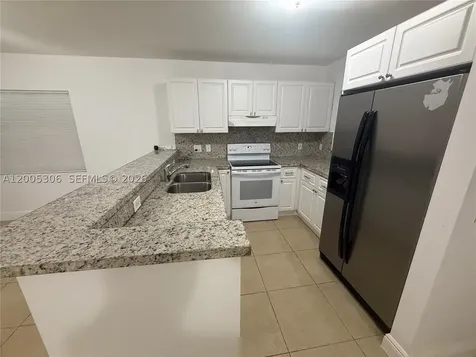 1565 NW 47th Street Miami FL 33142