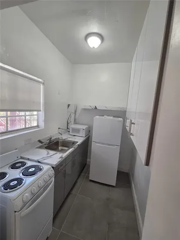 1945 NW 24th Court Miami FL 33125
