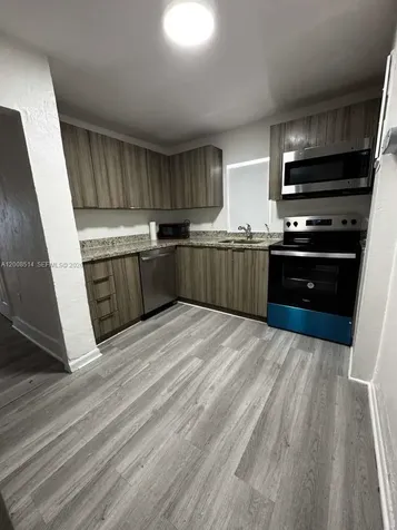 1121 NW 40th Street Miami FL 33127