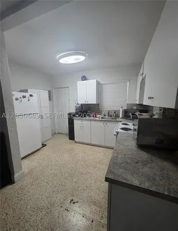 695 697 Curtiss Drive Opa-Locka FL 33054