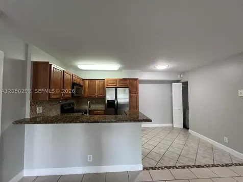 921 Lyons Road Coconut Creek FL 3523
