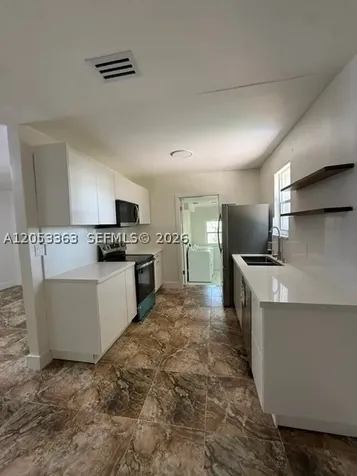 1121 NW 56th Street Miami FL 33127