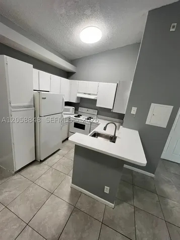 631 Lyons Road Coconut Creek FL 33063