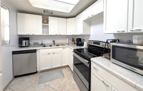 450 Golden Isles Drive Hallandale Beach FL 33009