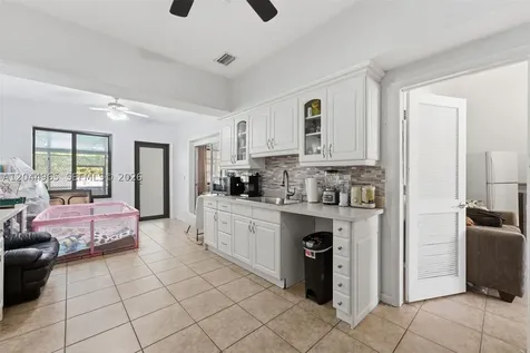 1421-1419 SW 76 Court Miami FL 33144