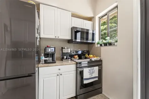 1421-1419 SW 76 Court Miami FL 33144