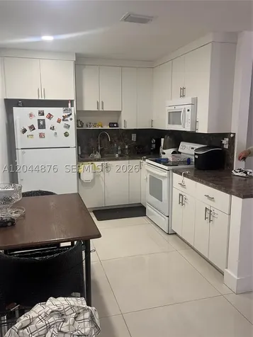 1195 NW 130th Street North Miami FL 33168