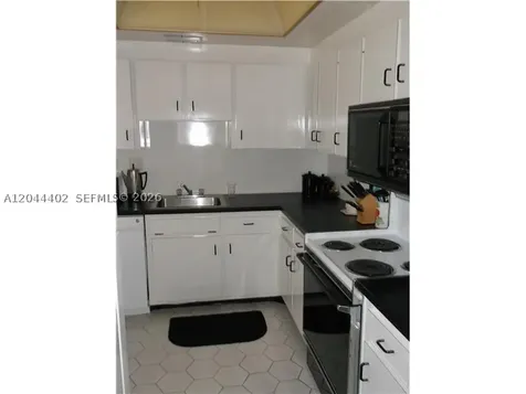 450 Golden Isles Drive Hallandale Beach FL 33009