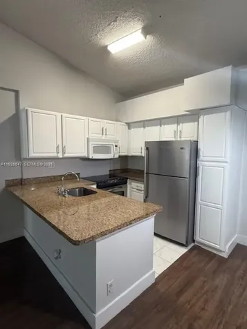 921 Lyons Road Coconut Creek FL 33063