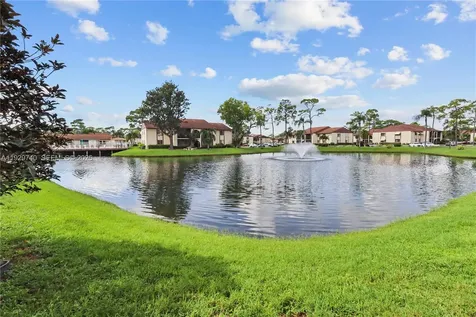 313 Knotty Pine Circle Green Acres FL 33463