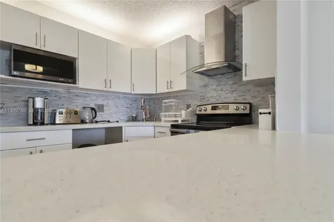 313 Knotty Pine Circle Green Acres FL 33463