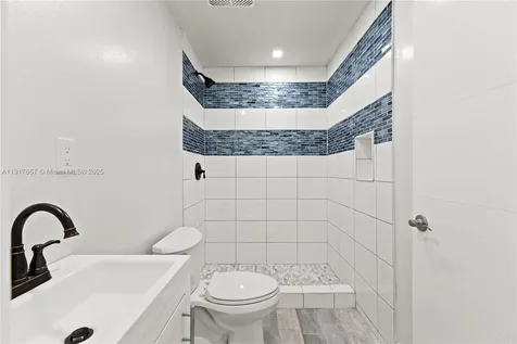 305 NW 58th Street Miami FL 33127