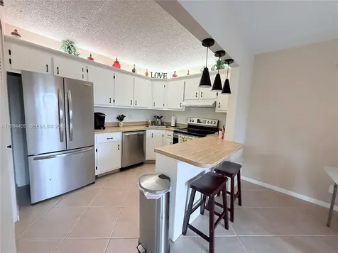 340 Pine Ridge Circle Green Acres FL 33463
