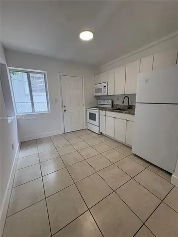 1128 NW 76th Street Miami FL 33150