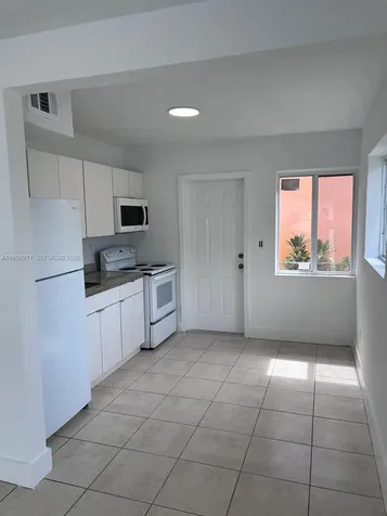 1128 NW 76th Street Miami FL 33150