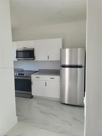 1975 NW 24th Court Miami FL 33125