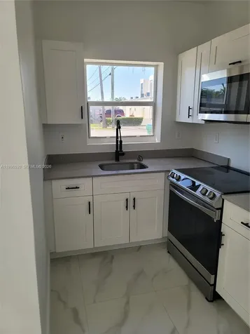 1975 NW 24th Court Miami FL 33125