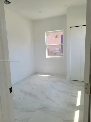 1975 NW 24th Court Miami FL 33125