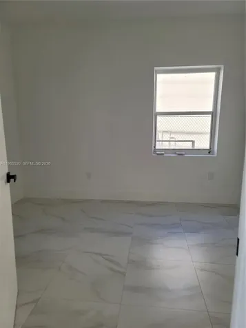 1975 NW 24th Court Miami FL 33125