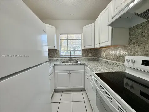 4140 Woodside Drive Coral Springs FL 33065