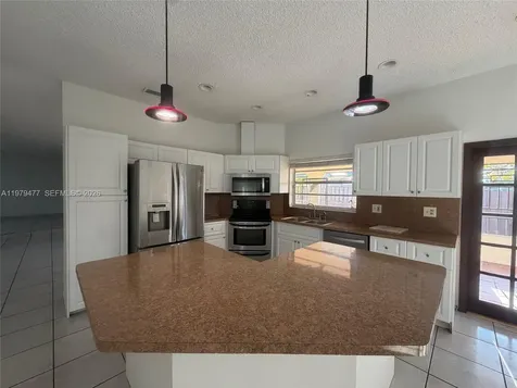 1090 NW 128th Court Miami FL 33182