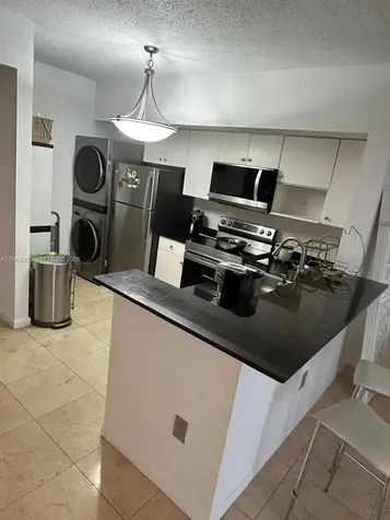 5077 NW 7th Street Miami FL 33126