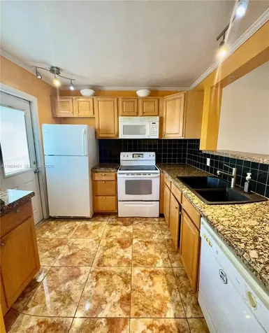 609 NE 14th Avenue Hallandale Beach FL 33009