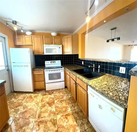 609 NE 14th Avenue Hallandale Beach FL 33009