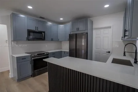 7128 NW 20th Avenue Miami FL 33147