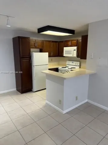 631 Lyons Road Coconut Creek FL 33063