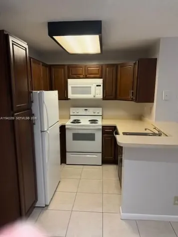 631 Lyons Road Coconut Creek FL 33063
