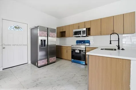 1126 NW 28 Miami FL 33127