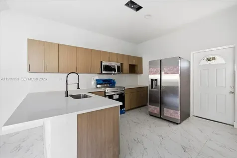 1126 NW 28 Miami FL 33127