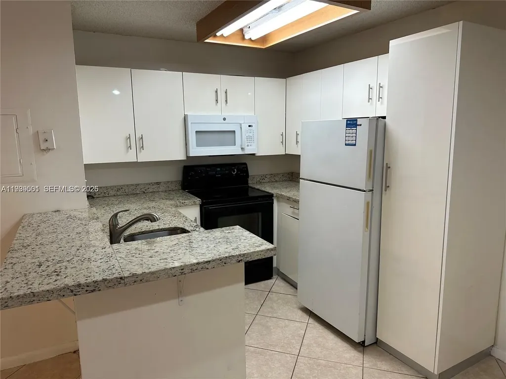 951 Lyons Road Coconut Creek FL 33063